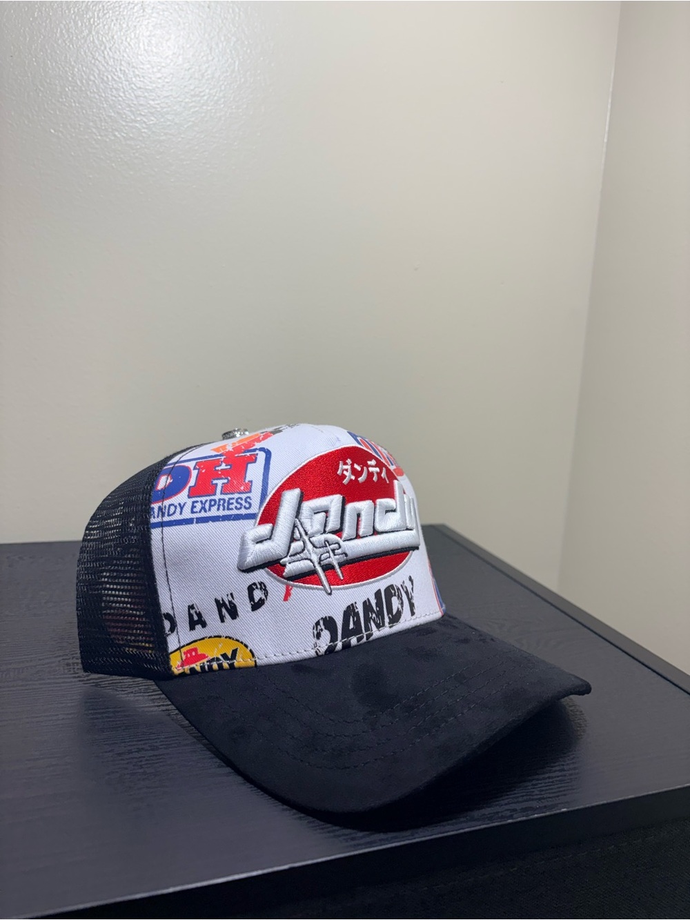 “Dandy Hat”White & Black Graphic Trucker Cap with Red Accent - Branded Print